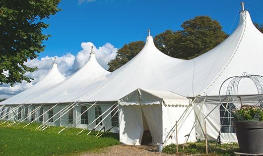 a line of portable restrooms in a shaded area, offering a comfortable experience for users in Country Club Hills